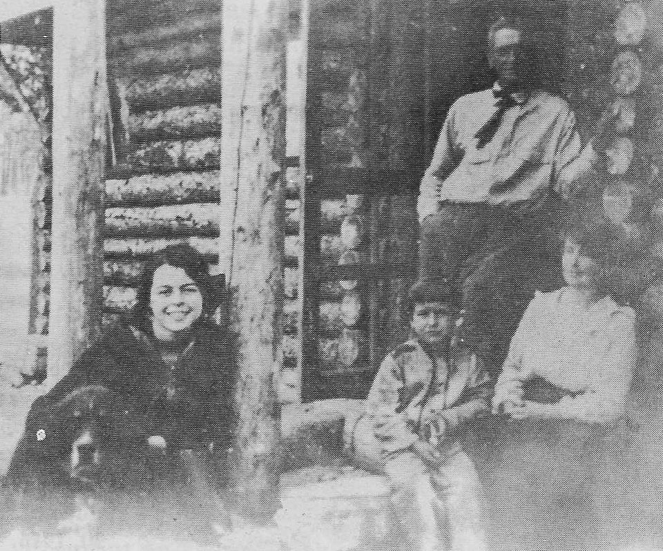 Leah, John, Henry, & Fannie Collins at the Collins homestead cabin - 1918