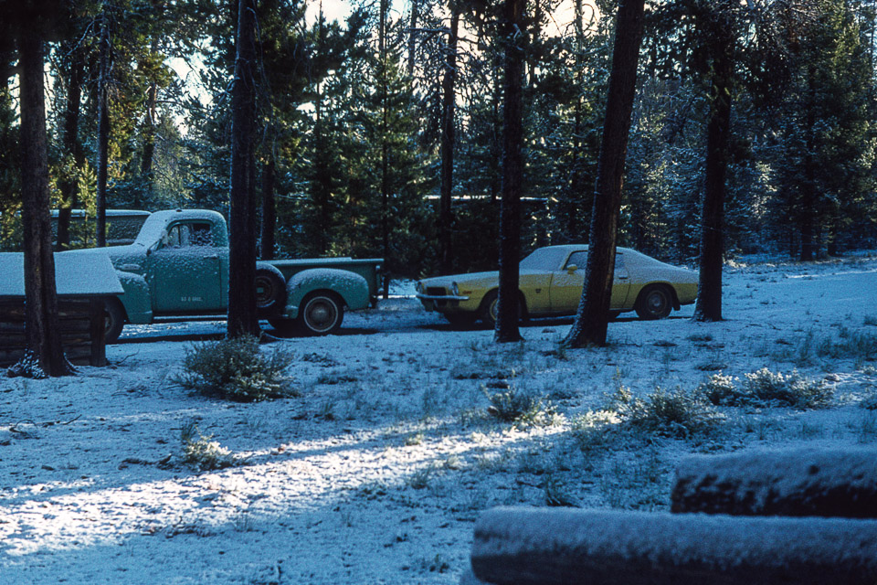 Captain Ahab (the 3/4 ton GMC pick-up) and the Camaro at the Ranch after a June snow - 1973