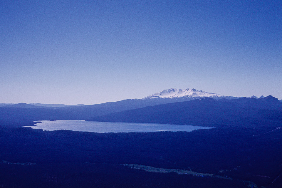 Crescent Lake with Diamond Peak in the background and the meadow of Big Marsh Creek in the foreground, from Odell Butte