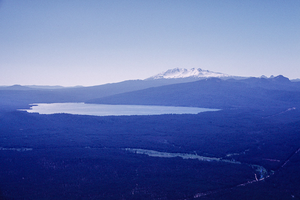 Crescent Lake with Diamond Peak in the background and the meadow of Big Marsh Creek in the foreground, from Odell Butte