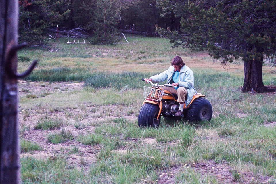 Mom driving Don's 3-wheel ATV.  Don loved that machine.  Leah didn't.