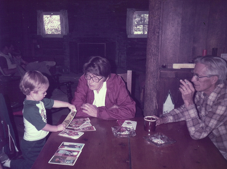 Brian, Mom, and Dad at the Dining Room table