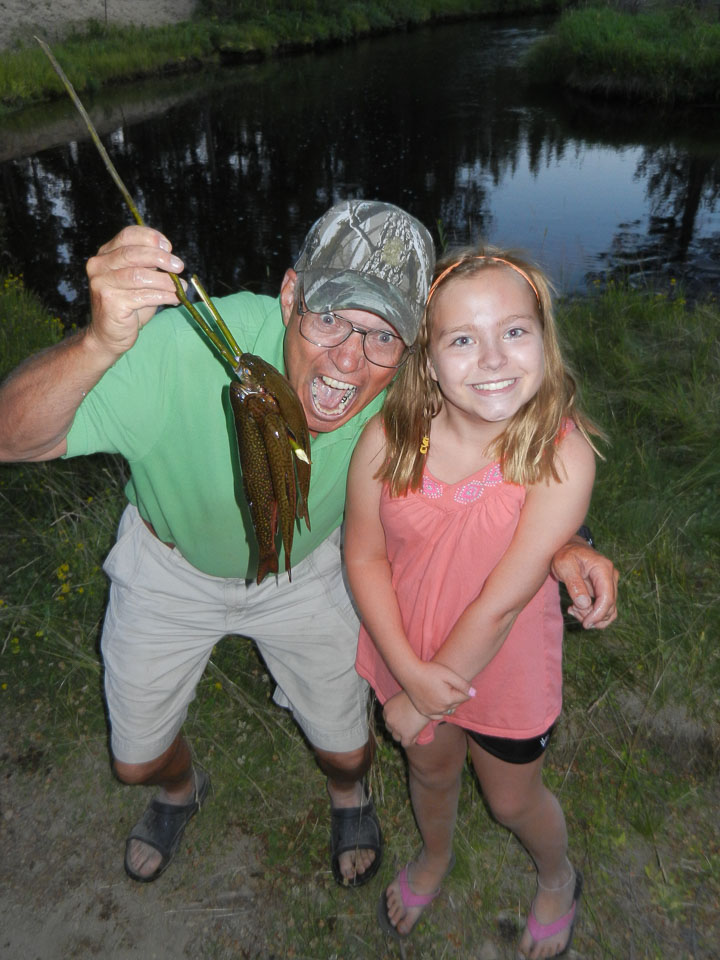 Eddo helped Maggie with her first time fishing
Photo provided by Bill and Alex Collins